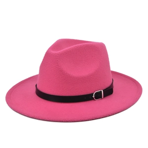 Detail view of hot pink wool fedora hat with flat brim and black leather belt buckle
