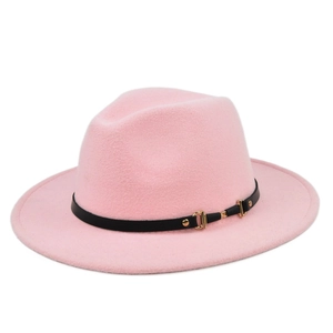 Detailed view of light pink fedora hat with black leather band and gold buckle detail