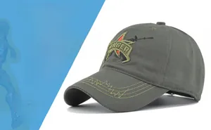 Detail of army green camo baseball cap with RANGER embroidery and wave stitching