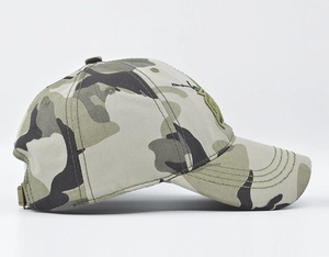 Detail view of camouflage baseball cap featuring 3D side embroidery and metal buckle strap