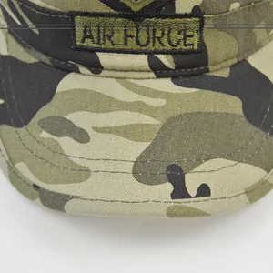 Detail view of cotton camo military cap featuring olive green Air Force embroidery