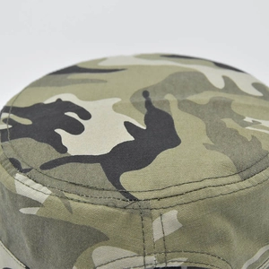 Top view detail of the round stitching and durable camo canvas fabric on military cap