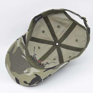 Detail view of the camouflage baseball cap interior featuring 100% cotton material