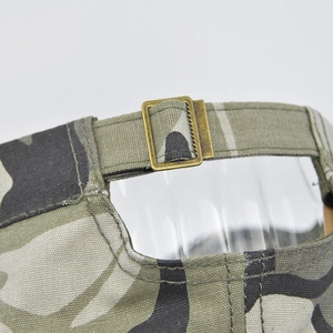Tactical camouflage baseball cap with adjustable vintage bronze buckle close-up view