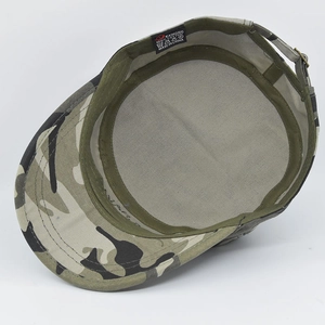 Detail view of the camouflage military cap interior showing sweatband and metal buckle