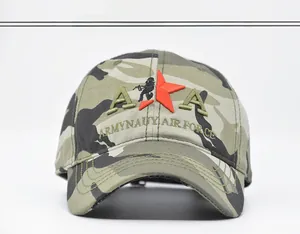 Close-up of 3D embroidery detail on the front of a jungle camouflage baseball cap