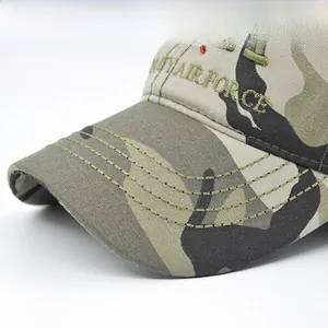 Detail of reinforced brim stitching and AIR FORCE embroidery on camouflage baseball cap