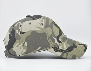 Detail view of camouflage baseball cap with metal buckle and reinforced stitching