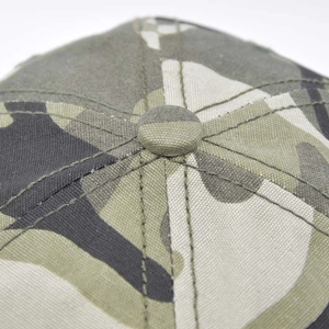 Detailed top view of camouflage baseball cap showing reinforced stitching and center button