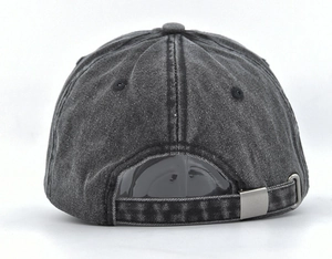 Detail view of the washed cotton baseball cap back with adjustable metal buckle closure