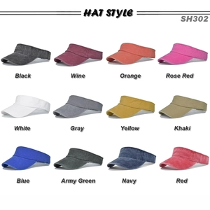 Color chart of washed cotton baseball caps showing twelve vintage distressed color options