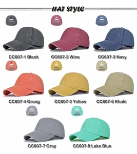 Detail view of washed cotton criss cross ponytail baseball caps in eight various colors