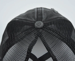 Detailed macro view of black washed cotton fabric and high ponytail elastic bands