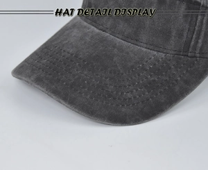 Detail of vintage washed charcoal baseball cap with reinforced stitching on the brim
