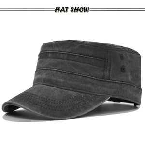 Detail of dark grey washed cotton cadet hat showing metal eyelets and parallel stitching