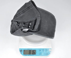 Detail of high pony baseball cap weighing 81.6g made of 100% washed cotton material