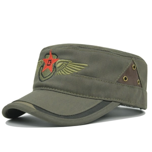 Detail of army green patrol cap featuring red star embroidery and gold metal eyelets