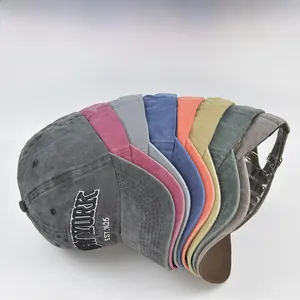 Detail showing various colors of washed cotton baseball caps with New York embroidery