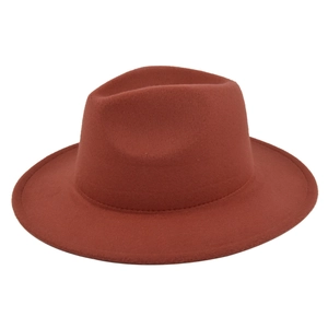 Close-up of a wide brim reddish-brown wool fedora hat with clean stitched edges