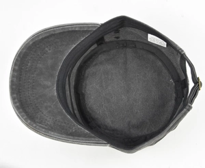 Detail view of cotton flat top army cap showing inner sweatband and 100% cotton label