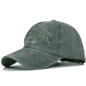 Detailed view of 3D New York embroidery on a vintage washed cotton baseball cap