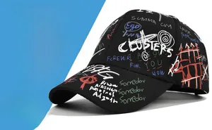 Detail of black cotton baseball cap with colorful street art graffiti and curved brim