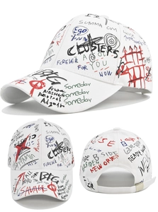 Detailed views of white cotton baseball cap with colorful graffiti print and metal buckle