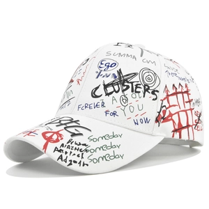 Streetwear baseball cap with colorful graffiti print on white cotton fabric background