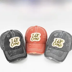 Detail of washed cotton baseball caps with distressed edges and I do Crew embroidery