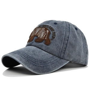 Detail of National Park bear patch embroidery on vintage washed cotton baseball cap