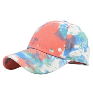 Detailed view of tie-dye baseball cap with colorful cotton fabric and curved brim
