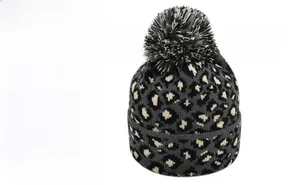 Detail of grey leopard print knit beanie with a plush pompom and thick ribbed texture