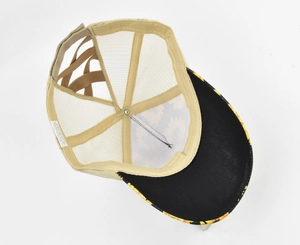 Detail of sunflower mesh hat featuring elastic criss-cross bands for high ponytails