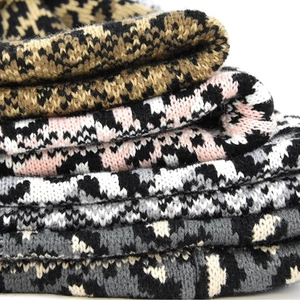 Thick knitted leopard and houndstooth beanies featuring soft textured warm winter fabric