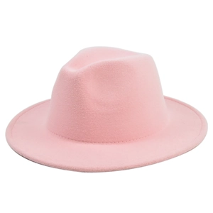 Detail of a pink wool fedora hat featuring classic teardrop crown and fine stitched brim