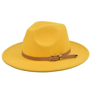 Detail of yellow wool fedora hat with brown leather band and golden heart buckle