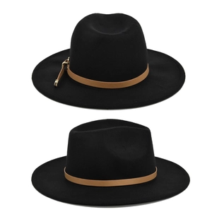 Detail of black wool fedora with camel leather band and golden metallic buckle