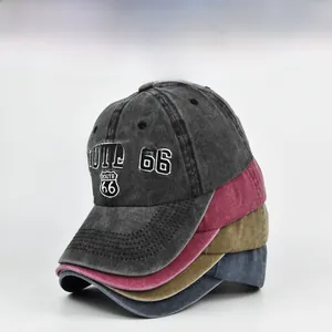 Detailed stack of Route 66 embroidered washed cotton baseball caps in four vintage colors