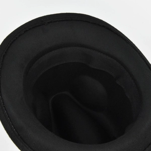 Detail of the inner black grosgrain sweatband and premium wool felt texture on the fedora