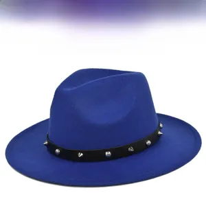 Detail of bright blue wool fedora with black leather band and silver punk rivets
