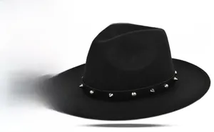 Detail of wide brim wool fedora hat featuring black leather band with silver punk rivets