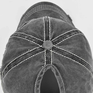 Close-up of washed gray ponycap showing contrast stitching and ponytail opening detail