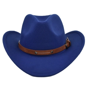 Detail of dark blue felt cowboy hat with brown faux leather strap and metal rivets