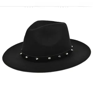 Detail of black wool fedora with leather band featuring silver punk metallic rivets