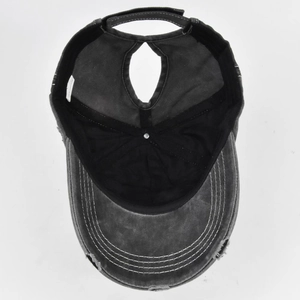 Detail view of the high ponytail opening on this distressed washed cotton baseball cap
