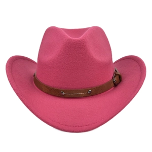 Detail of rose red cowboy hat with brown leather band and metal buckle ornament