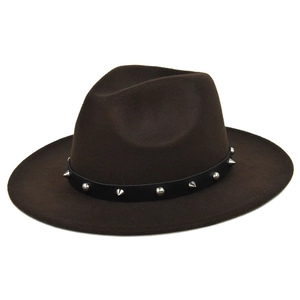 Macro detail of dark brown wool felt fedora with silver metal rivets on black leather band