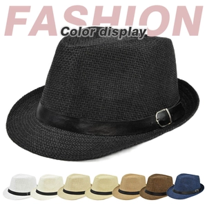 Detail view of woven straw fedora hats with leather buckle bands in various colors