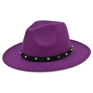Detailed close-up of purple wool fedora with black punk style studded band decoration