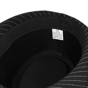 Detail view of the fedora hat's inner sweatband, 58 size tag, and cotton-polyester material